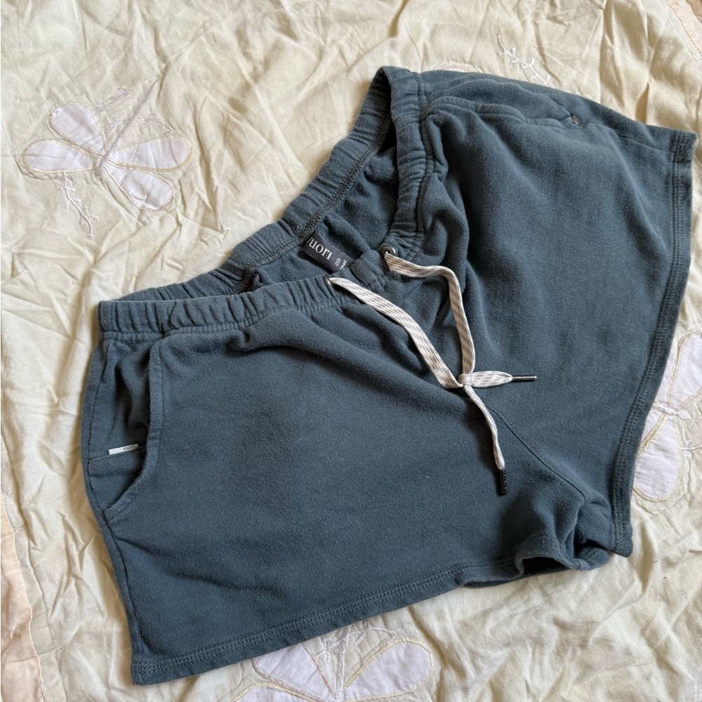 Vuori Athletic Shorts in Teal